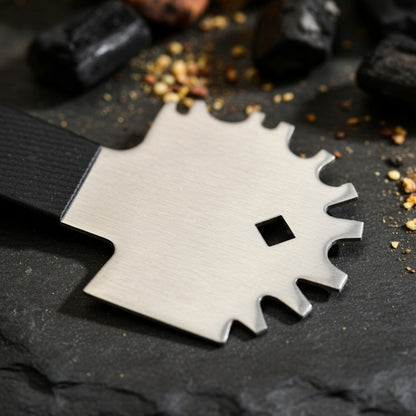 Close-up of stainless steel scraper edge for braai grids